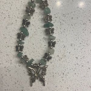 Sage green stone and butterfly chain necklace